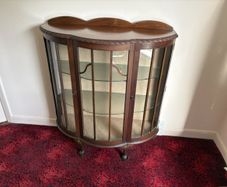 Vintage bow front display cabinet