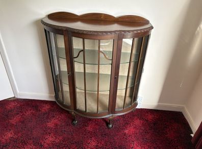 Vintage bow front display cabinet