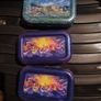 Three Pokemon tins with two coins. Image 6