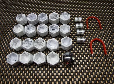 Wheel nut covers and valve caps