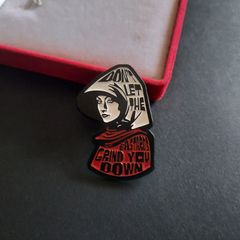 The Handmaid's Tale Enamel Pin "Don't let the bastards grind you down"