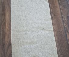 Beige rug
