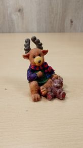 Bear and moose ornament