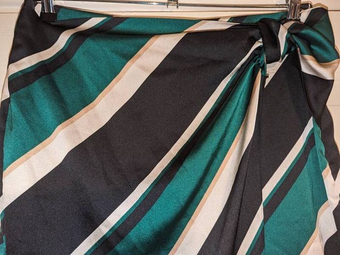 Perfect for Summer. Stunning wrap effect multi colour midi skirt