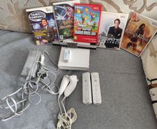 Wii with Mario Bros, Pokemon, Price of Persia
