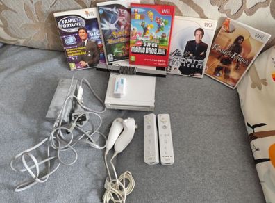 Wii with Mario Bros, Pokemon, Price of Persia