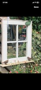 Garden mirror window