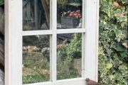 Garden mirror window