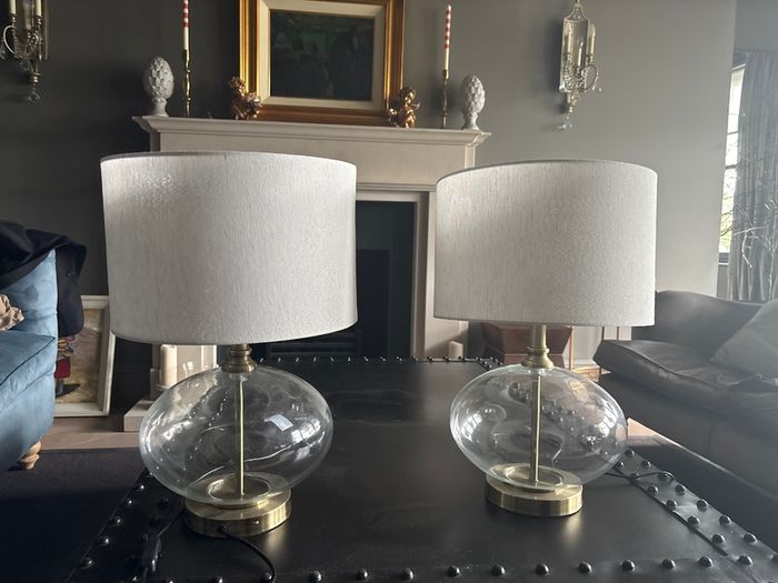 Pair of matching brass and glass table lamps