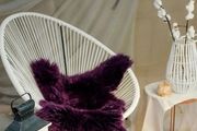 warm and cosy purple sheepskin rug