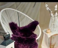 warm and cosy purple sheepskin rug