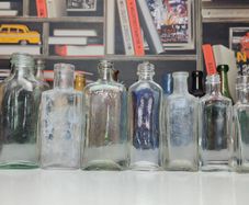 193 - Set of 7 Vintage Clear Glass Collectible Decorative Bottles