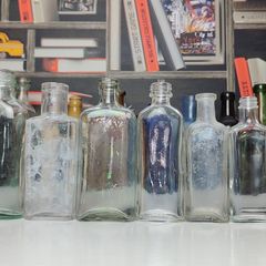 193 - Set of 7 Vintage Clear Glass Collectible Decorative Bottles