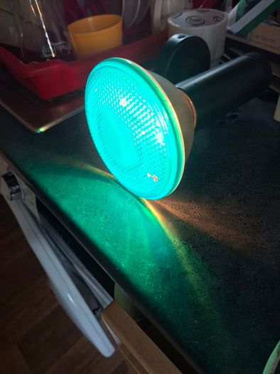 Large Theatrical or Display Lighting, including reflector lamps and colored PAR-style bulbs, with various lamp holders, plugs, and coiled electrical leads all working