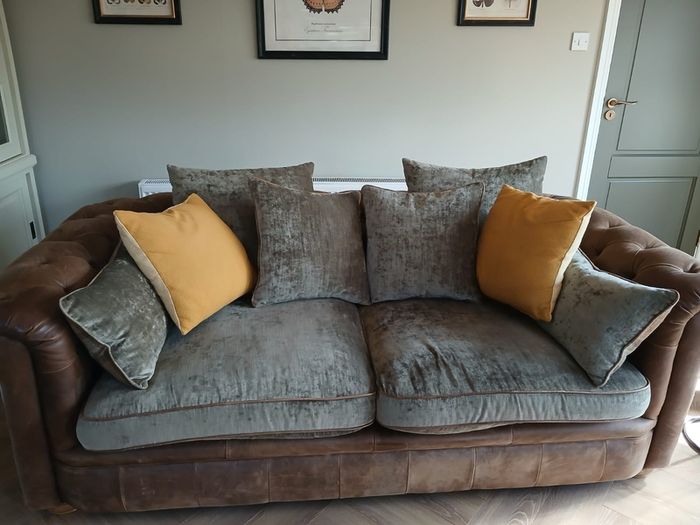 Chesterfield couch & 2 single chairs in brown leather and sage green cushions. Perfect condition,  non smokers, no house pets.  Couch Width 7ft, Depth 4ft. Chairs Width 3ft2ins, Depth 3ft