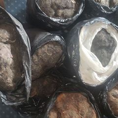Description: Job lot of vintage horsehair and natural upholstery stuffing, split across 8.5 black bin bags.