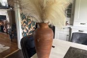 Terracotta vase with artificial grass