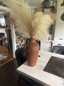 Terracotta vase with artificial grass