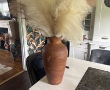 Terracotta vase with artificial grass