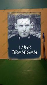 Lugs Branigan tin metal sign