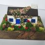 Handcrafted tiny wooden cottage Image 2