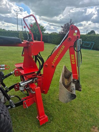 Backhoe digger for compact tractor.