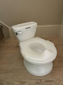 Toilet style potty with flush noise!