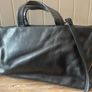Tula black leather tote bag with a shoulder strap. Image 2
