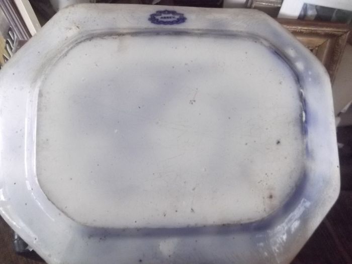 a large antique meat platter called flow blue date 1850