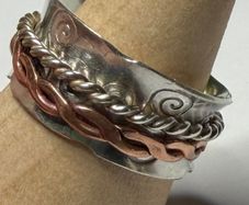 Handmade sterling silver fidget spinner ring with copper.