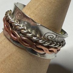 Handmade sterling silver fidget spinner ring with copper.
