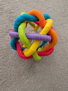 Spin rattle toy