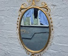 A Mirror Large heavy Vintage Rococo design filly bevelled oval Mirror