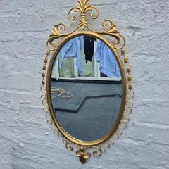 A Mirror Large heavy Vintage Rococo design filly bevelled oval Mirror