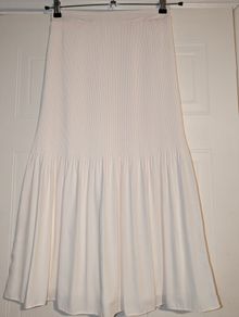 Perfect for Summer. beautiful cream pleated midi skirt