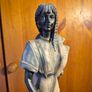 Vintage Sculpture of an Elegant Lady with a Dog Image 2