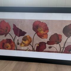 Black framed picture of poppies