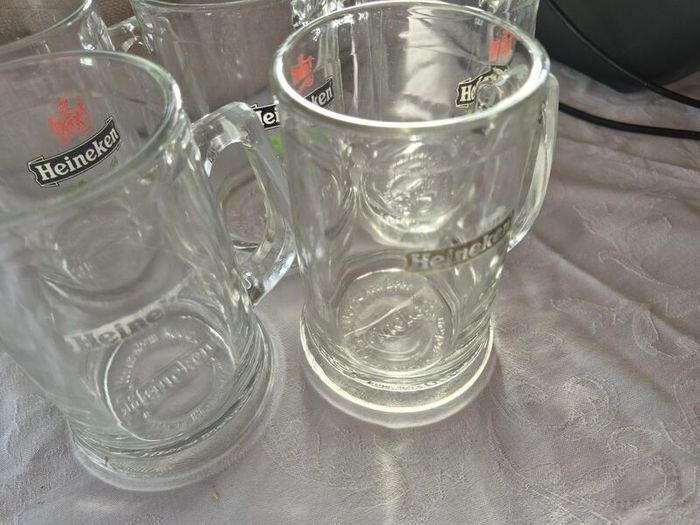 5 Vintage Heineken 1/2 pint, glass beer tankards/mugs.
