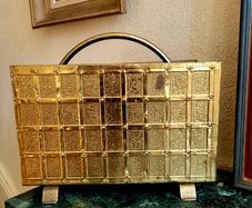 Mid-century embossed brass magazine holder