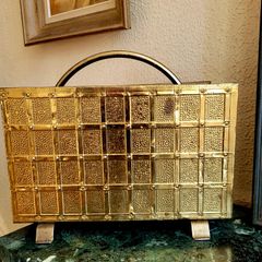 Mid-century embossed brass magazine holder