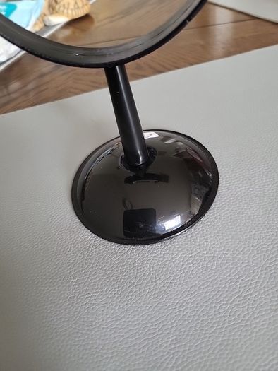 Glass prism on stand