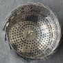 This is a collapsible stainless steel steamer basket Image 2