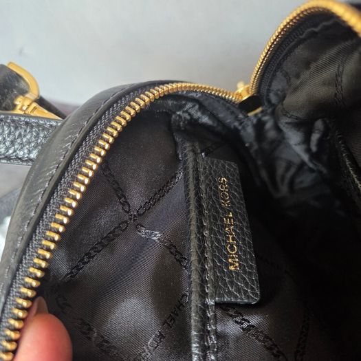 Genuine Michael Kors black mini backpack convertible crossbody in excellent condition