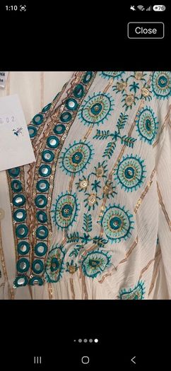 Stunning maxi dress  one size fits all .  new with tags  beautiful  on