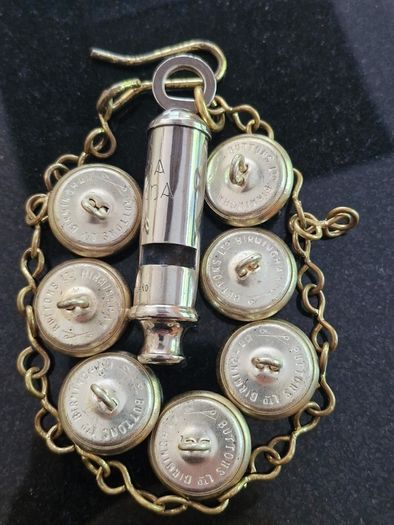 An Early Garda Siochana Whistle And Set Of 7 Buttons