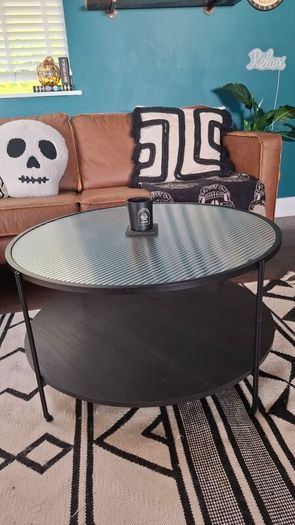Glass & black wood/metal coffee table