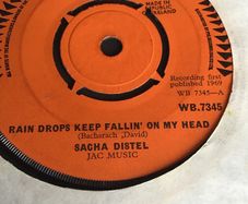 Sacha Distel vinyl single record - Raindrops keep falling on my head