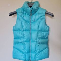 Nike fleece puffer vest Size large girls 26" long turquoise in excellent condition