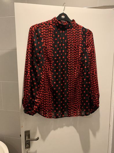 Dramatic polka dot blouse