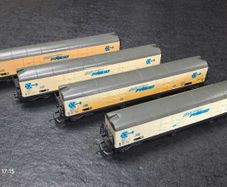 Set of four double-bogie HO scale Lima wagons